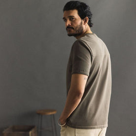 fit model showing the back of The Rugby Tee in Smoked Olive
