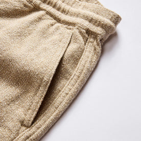 material shot of the front pocket on The Apres Pant in Oat Linen Tweed