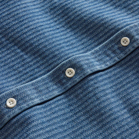 material shot of the buttons on The Utility Shirt in Washed Indigo Herringbone