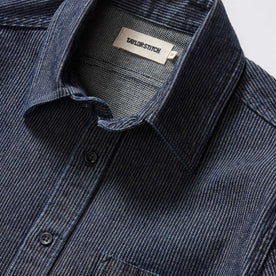 material shot of the collar on The Utility Shirt in Rinsed Indigo Stripe