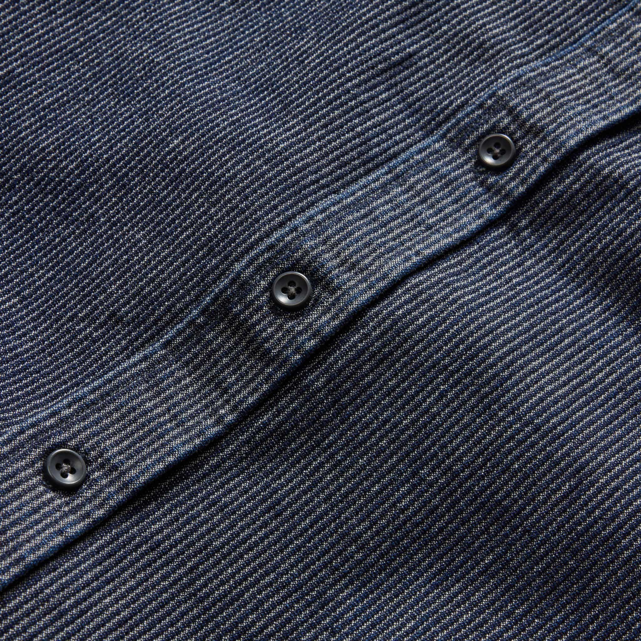 material shot of the charcoal buttons on The Utility Shirt in Rinsed Indigo Stripe, Wovens by Taylor Stitch