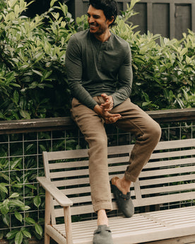 fit model sitting in The Apres Pant in Cypress Sashiko, Bottoms by Taylor Stitch