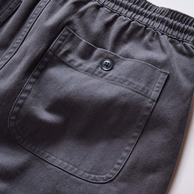 material shot of the back pocket on The Apres Short in Organic Dark Blue Foundation Twill