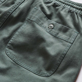material shot of the back pockets of The Apres Short in Organic Deep Sea Foundation Twill