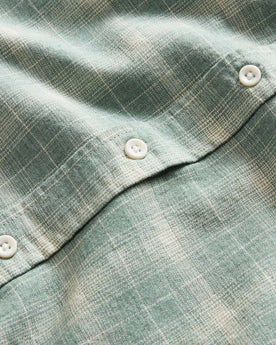 material shot of the buttons on The California in Sea Moss Plaid, Wovens by Taylor Stitch