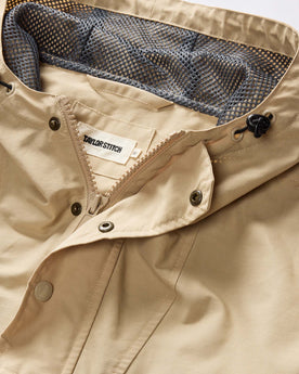 material shot of the hood and collar on The Chapman Anorak in Light Khaki, Outerwear by Taylor Stitch