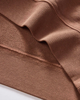 material shot of the ribbed hem on The Cotton Hemp Crew in Faded Brick, Knits by Taylor Stitch