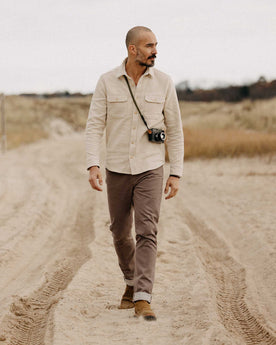 fit model walking in The Division Shirt in Birch, Wovens by Taylor Stitch