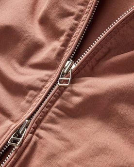 material shot of the two-way zipper on The Flint Jacket in Faded Brick Broken Twill, Outerwear by Taylor Stitch
