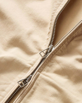 material shot of the two-way zipper on The Flint Jacket in Light Khaki Broken Twill, Outerwear by Taylor Stitch