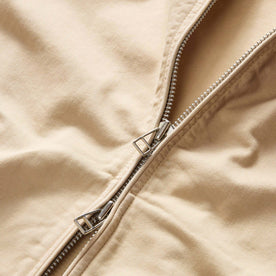 material shot of the two-way zipper on The Flint Jacket in Light Khaki Broken Twill