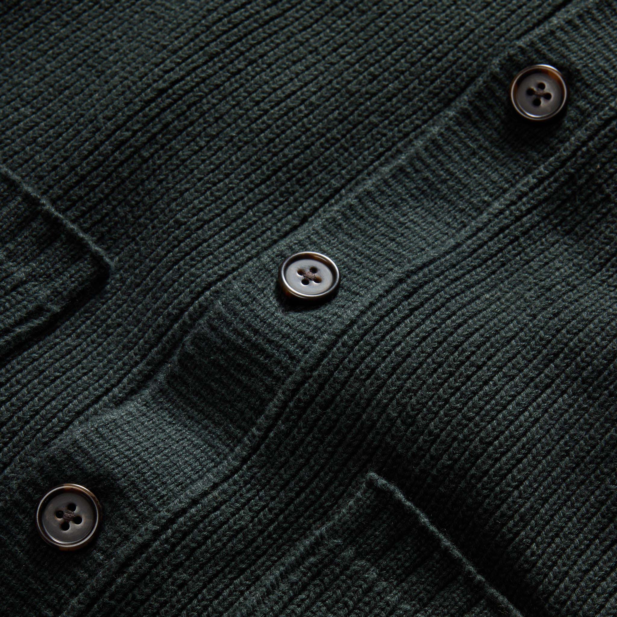 material shot of the horn-colored buttons on The Harbor Sweater Jacket in Black Pine Heather, Knits by Taylor Stitch