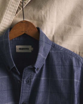 The Jack in Navy Twist Plaid on a hanger, Wovens by Taylor Stitch