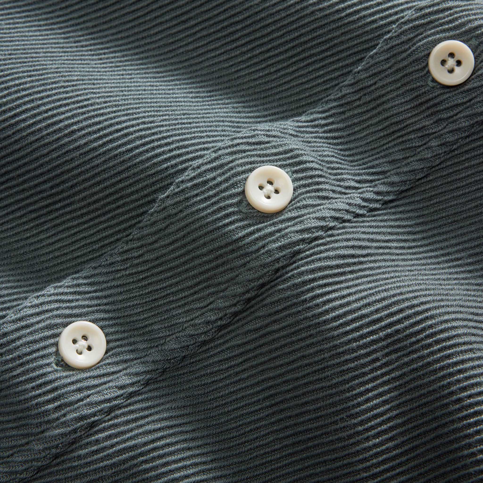 material shot of the buttons on The Ledge Shirt in Deep Sea Twill, Wovens by Taylor Stitch