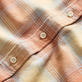 material shot of the natural colored buttons on The Ledge Shirt in Sunrise Plaid