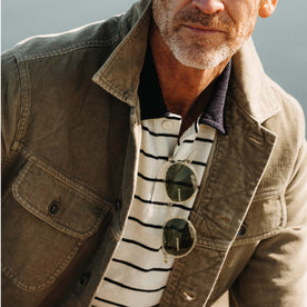 fit model showing off the collar on The Long Haul Jacket in Light Sage Cord