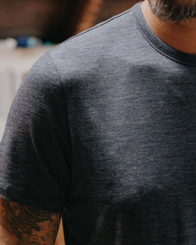 fit model showing off shoulder detail on The Merino Tee in Heather Navy, Knits by Taylor Stitch
