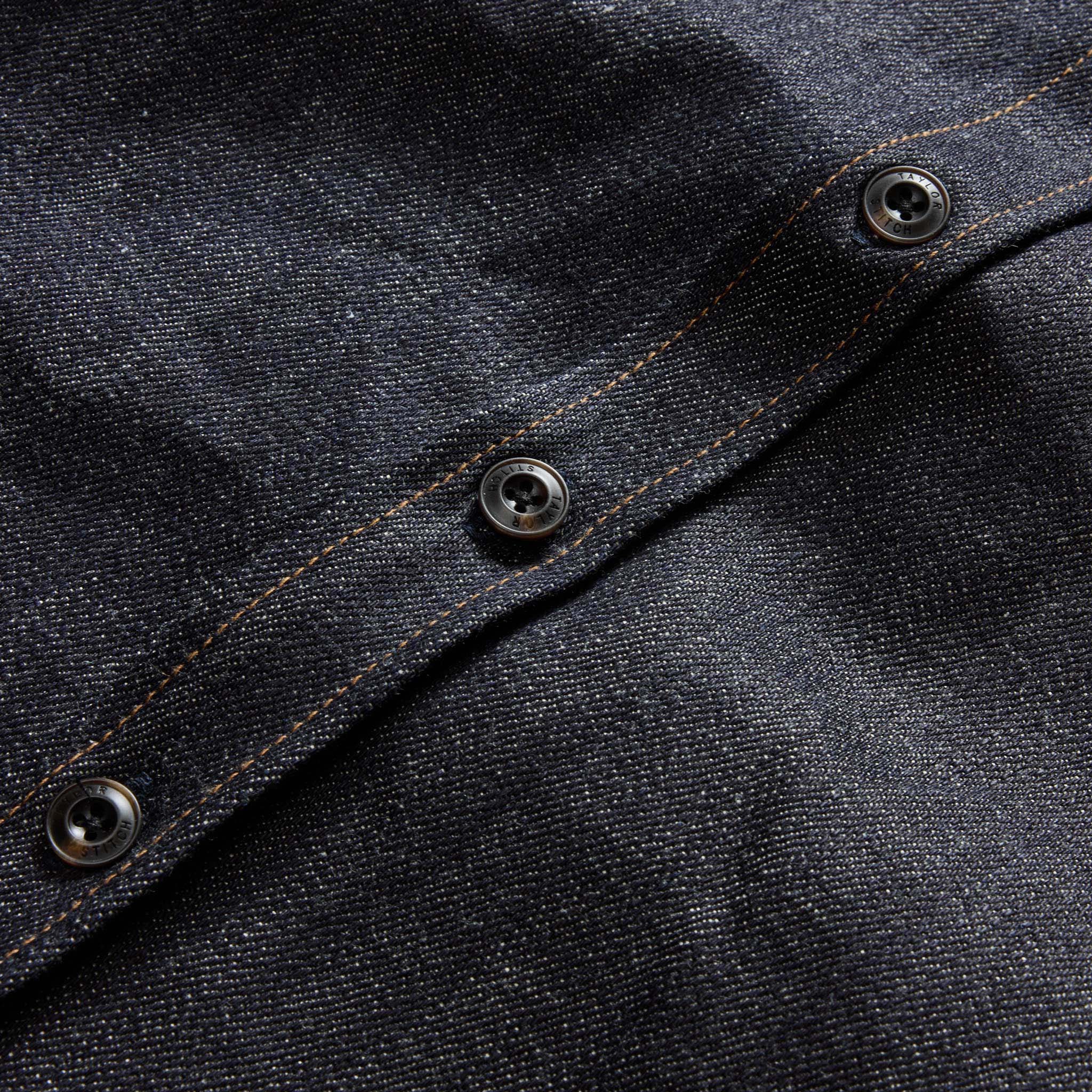 material shot of the buttons on The Mill Shirt Jacket in Kuroki Slub Denim, Outerwear by Taylor Stitch