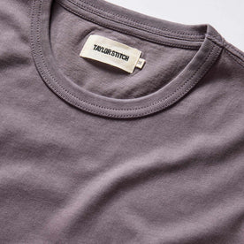 material shot of the ribbed neck opening on The Organic Cotton Tee in Dried Plum