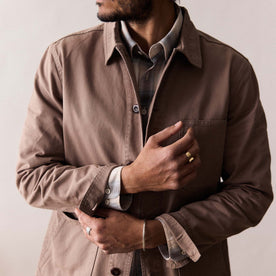 fit model adjusting the cuffs on The Ojai Jacket in Organic Dried Earth Foundation Twill