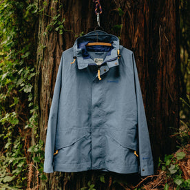 The Owens Parka in Moonlight Gore-Tex hanging in the woods