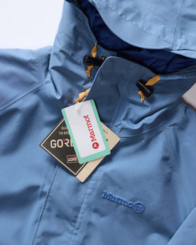 material shot of the marmot and goretex labels on The Owens Parka in Moonlight Gore-Tex, Outerwear by Taylor Stitch