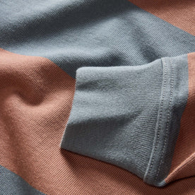 material shot of the sleeves on The Rugby Shirt in Faded Brick Stripe