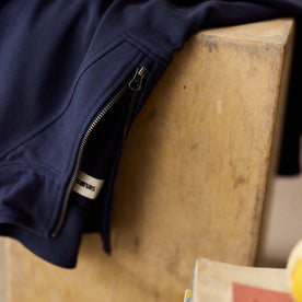 editorial image of the zipper on The Rugby Quarter Zip in Faded Navy