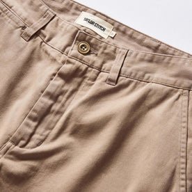 material shot of the button fly on The Slim Foundation Pant in Dried Earth