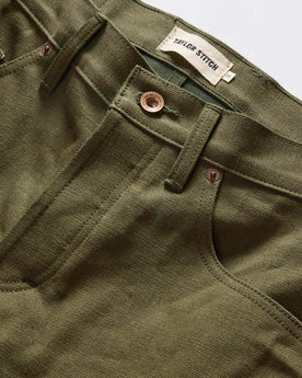 material shot of the waistband on The Slim Jean in Olive Nihon Menpu Selvage, Bottoms by Taylor Stitch