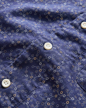 material shot of the buttons on The Short Sleeve Hawthorne in Dark Navy Floral, Wovens by Taylor Stitch
