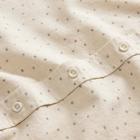 material shot of the natural buttons on The Short Sleeve Jack in Heather Oat Dot