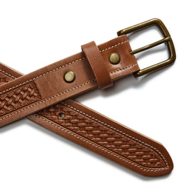 flatlay of the clasp on The Tooled Belt in Saddle Tan
