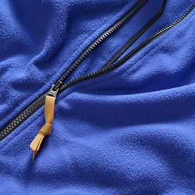 material shot of the YKK zipper and zipper pull on The Trail Fleece in Alpine Dusk