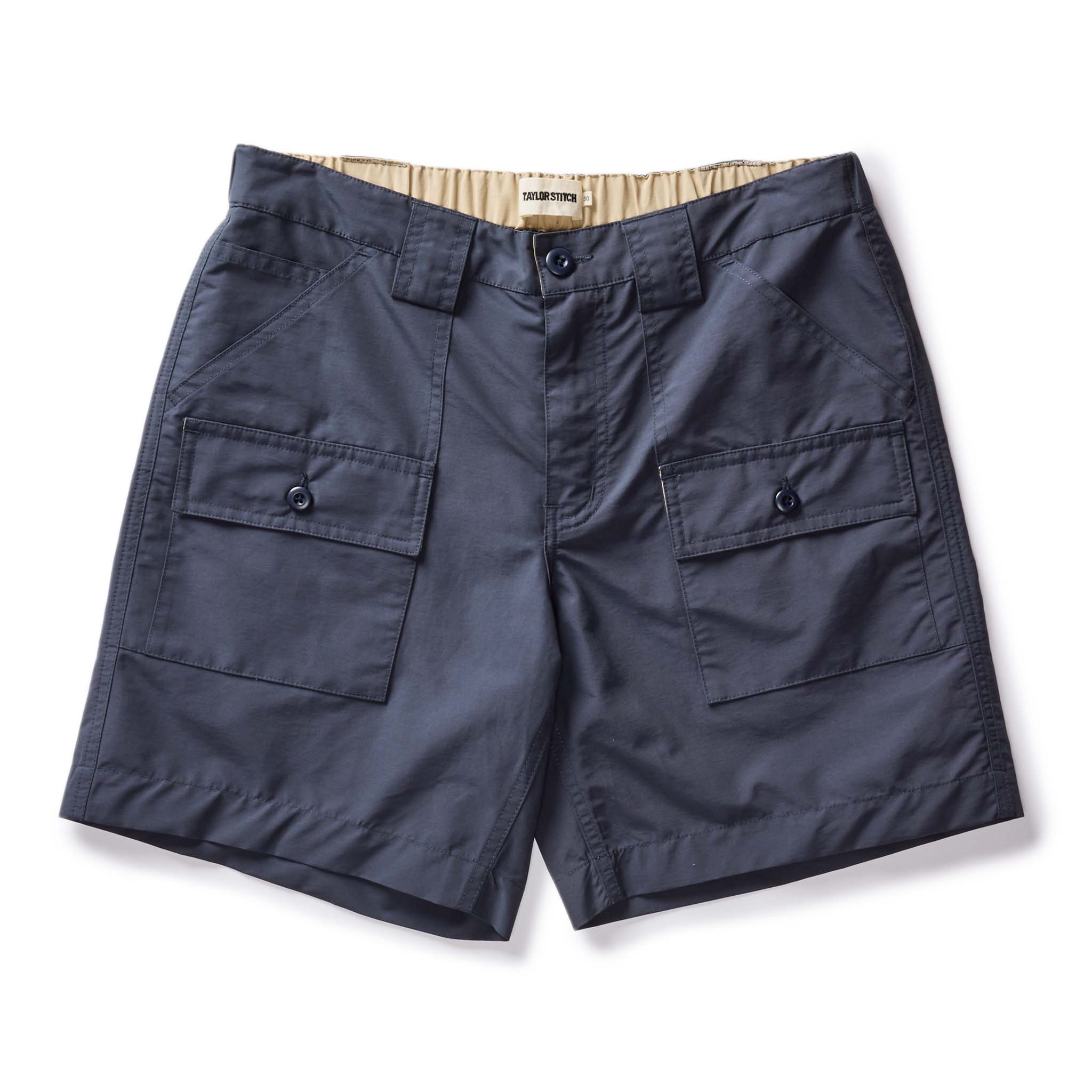 flatlay of The Trail Cargo Short in Faded Navy 60/40 Faille, Bottoms by Taylor Stitch