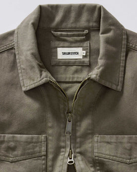 material shot of the collar on The Station Jacket in Fatigue Olive Broken Twill, Outerwear by Taylor Stitch