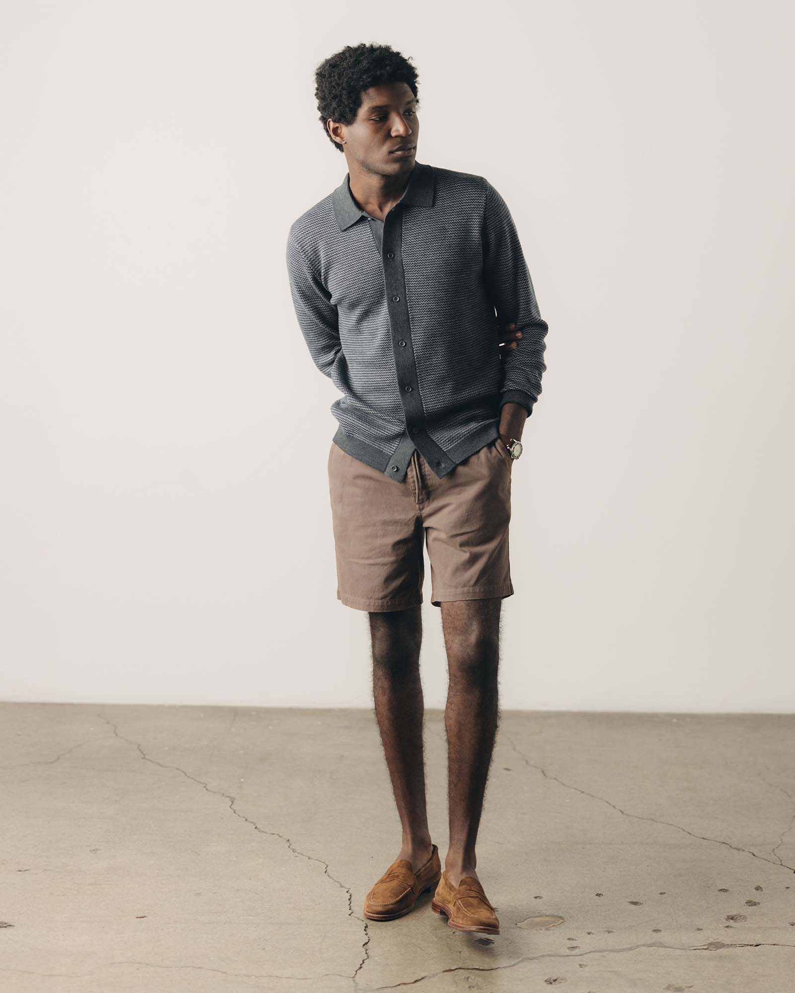fit model posing in The Apres Short in Organic Espresso Foundation Twill, Bottoms by Taylor Stitch