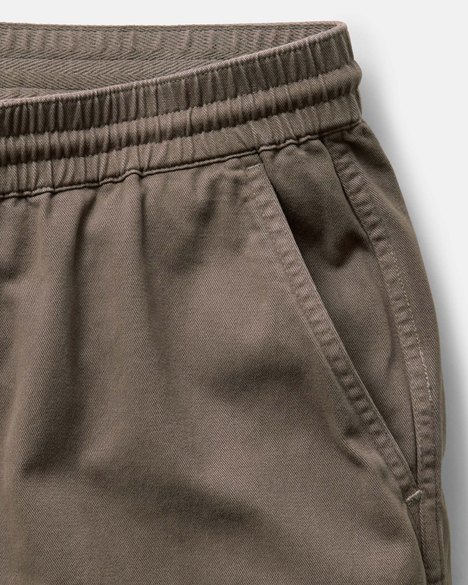 material shot of the pocket on The Apres Short in Organic Espresso Foundation Twill, Bottoms by Taylor Stitch