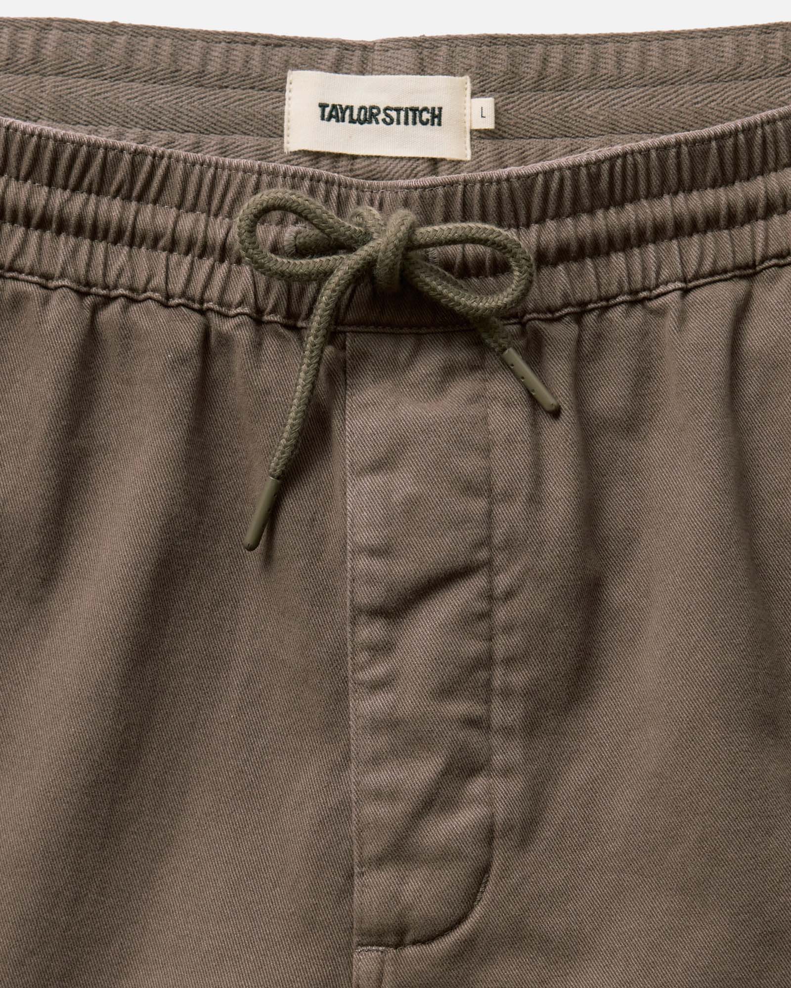 material shot of the waistband on The Apres Short in Organic Espresso Foundation Twill, Bottoms by Taylor Stitch