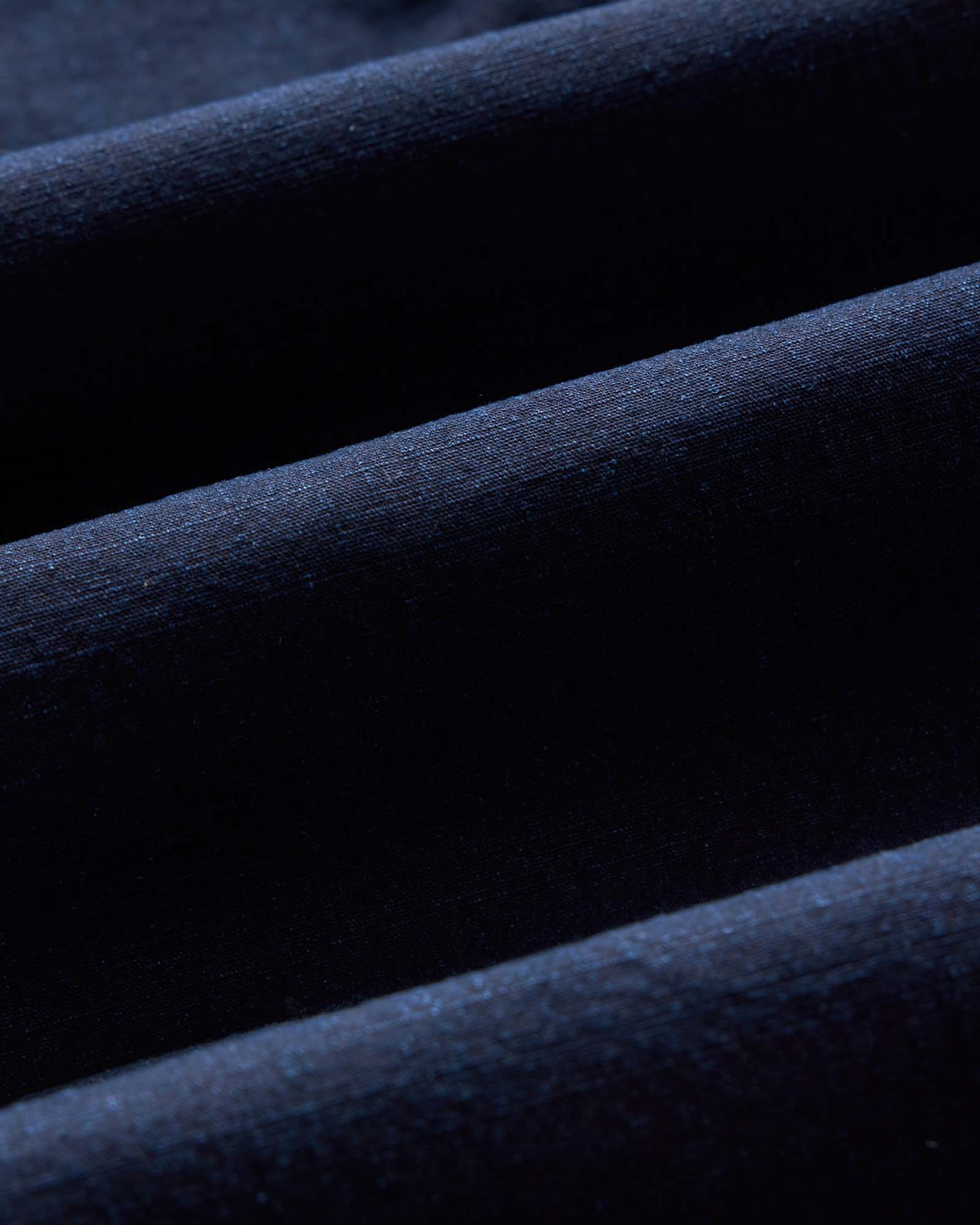 flatlay of The Breakwater Pant in Rinsed Indigo Ripstop, Bottoms by Taylor Stitch