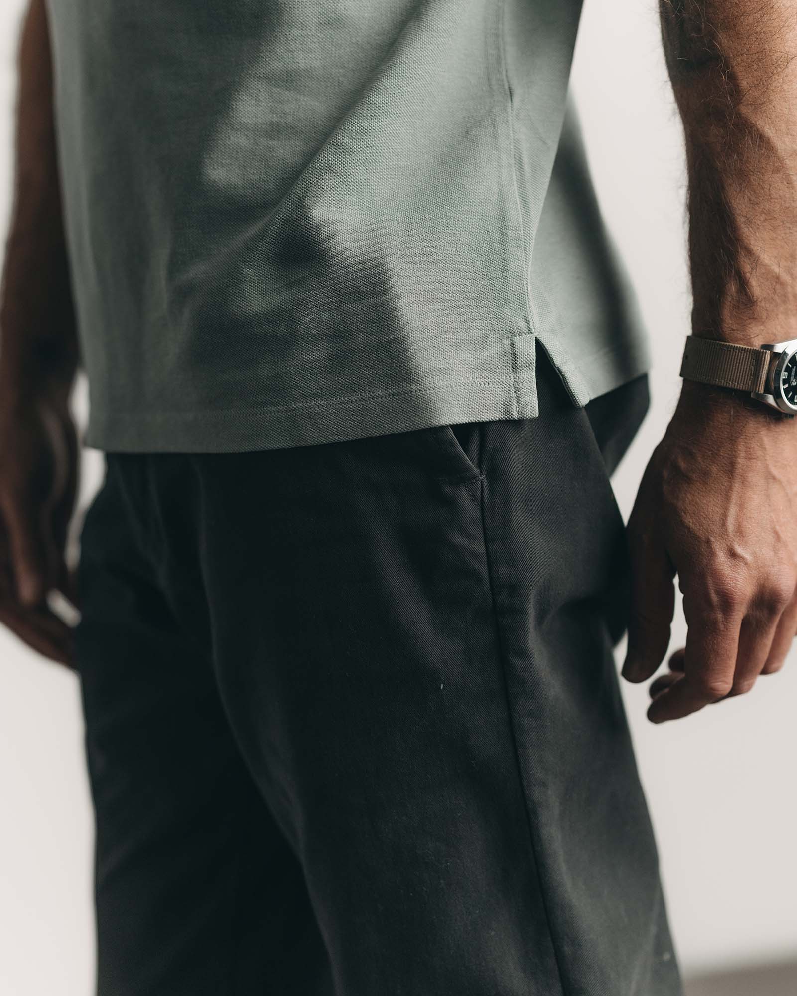 fit model showing off the back of The Democratic Foundation Pant in Organic Faded Black, Bottoms by Taylor Stitch