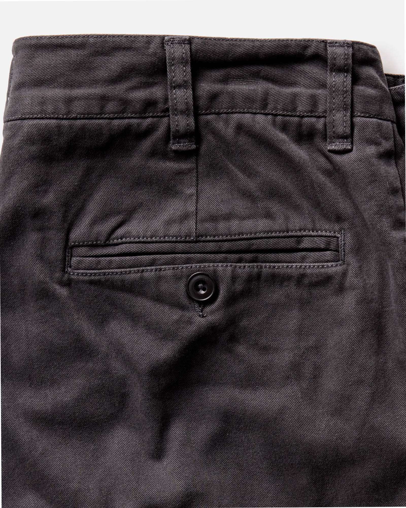 flatlay of The Democratic Foundation Pant in Organic Faded Black, Bottoms by Taylor Stitch