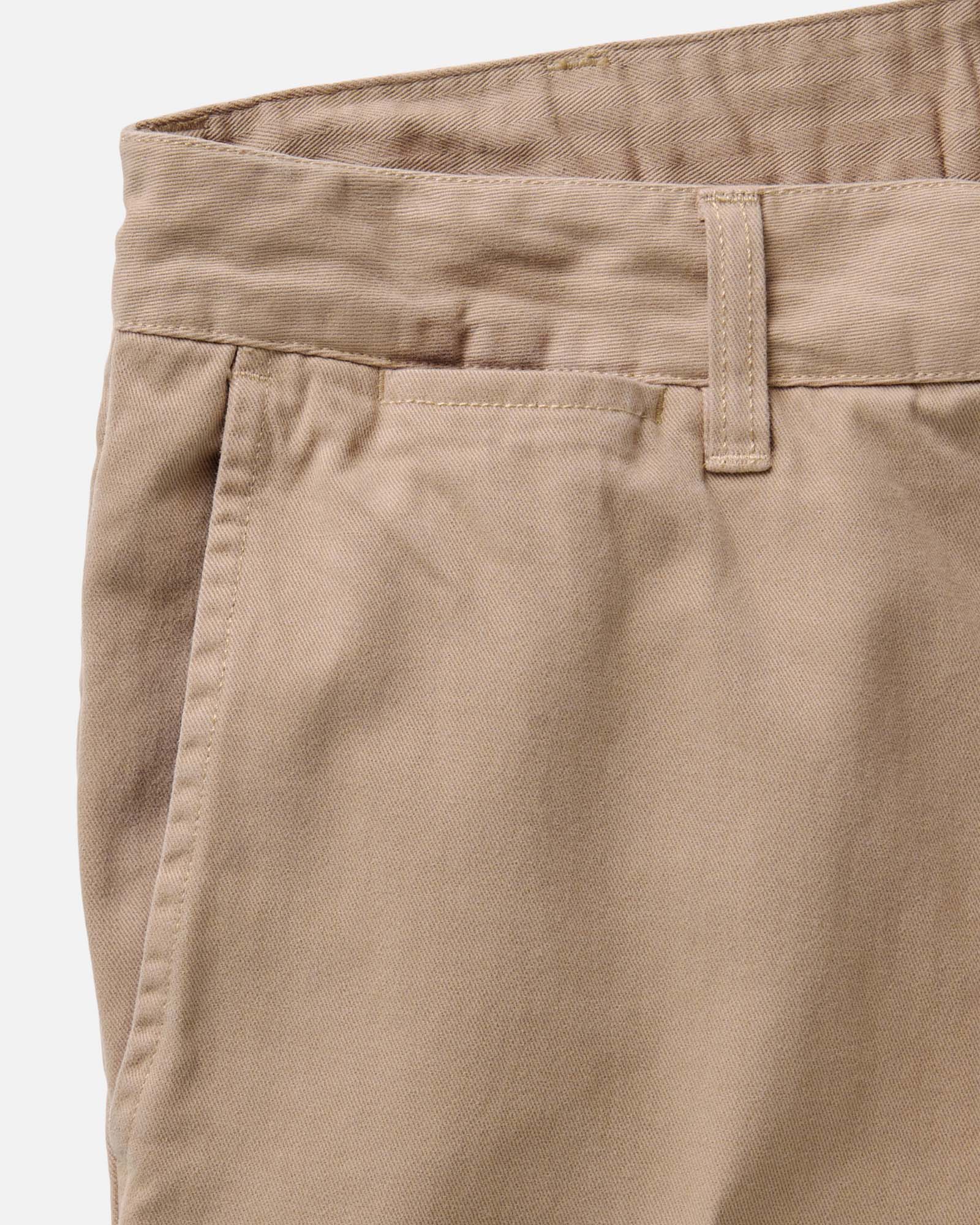 material shot of the back button-through pocket on The Democratic Foundation Pant in Organic Khaki, Bottoms by Taylor Stitch