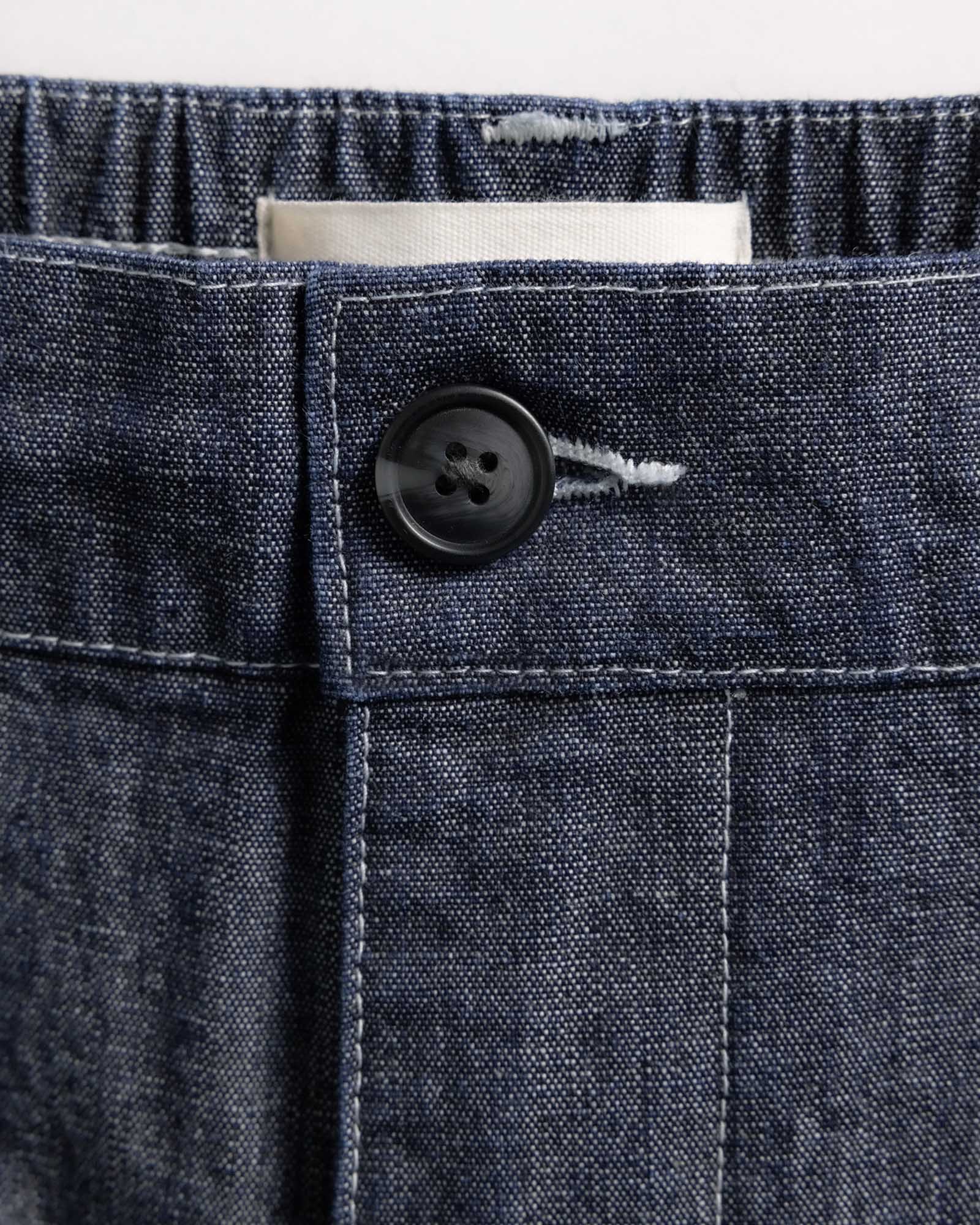 material shot of the button on The Easy Pant in Washed Indigo Chambray, Bottoms by Taylor Stitch