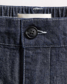 material shot of the button on The Easy Pant in Washed Indigo Chambray, Bottoms by Taylor Stitch