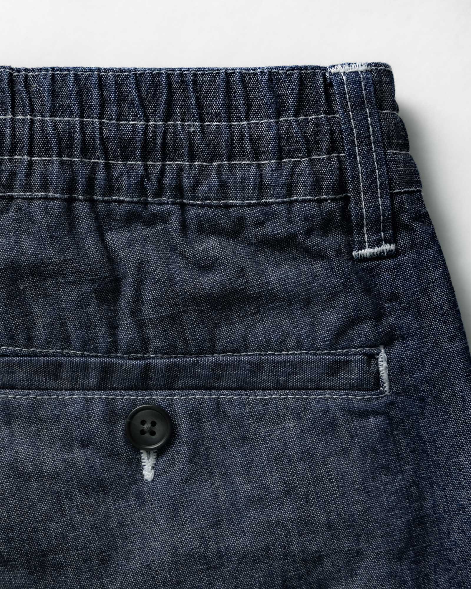 material shot of the back pocket on The Easy Pant in Washed Indigo Chambray, Bottoms by Taylor Stitch