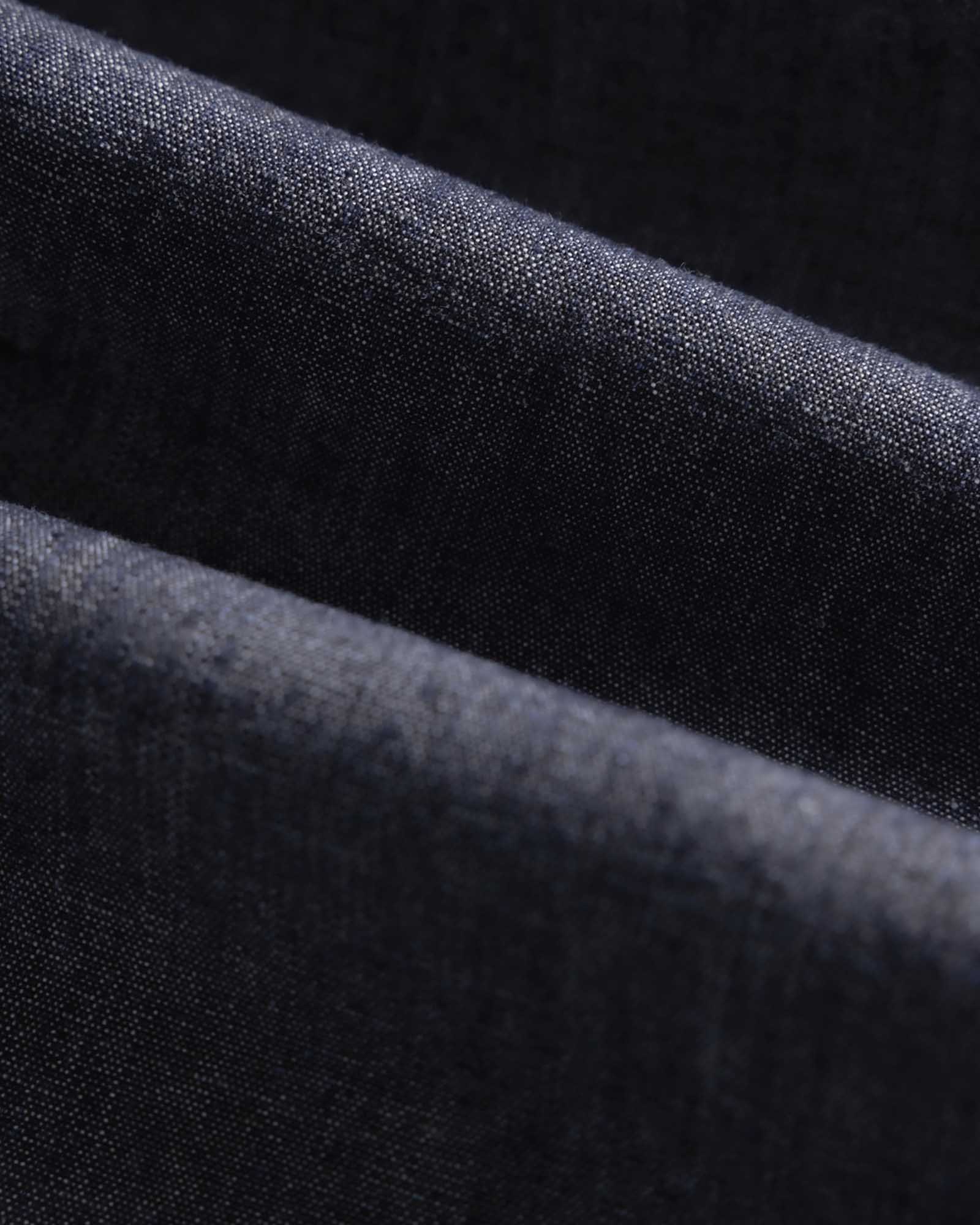 material shot of the fabric on The Easy Pant in Washed Indigo Chambray, Bottoms by Taylor Stitch