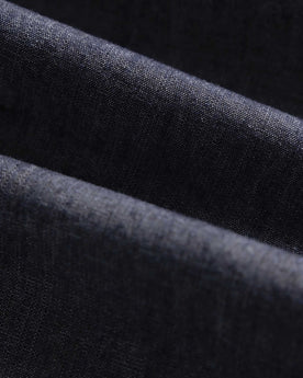 material shot of the fabric on The Easy Pant in Washed Indigo Chambray, Bottoms by Taylor Stitch