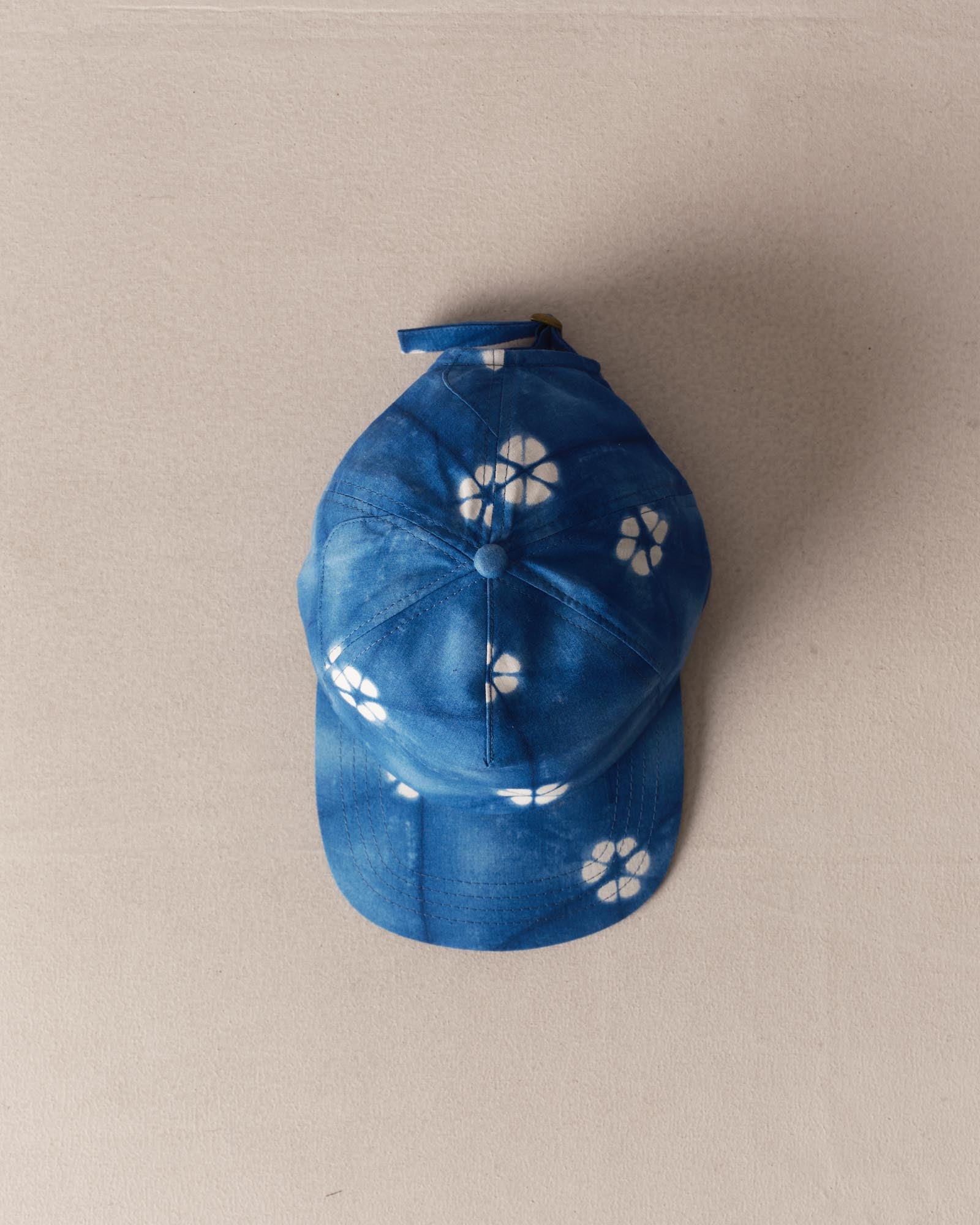 editorial image of The Taylor Stitch x Hypeadelic Cap v2.04 hanging