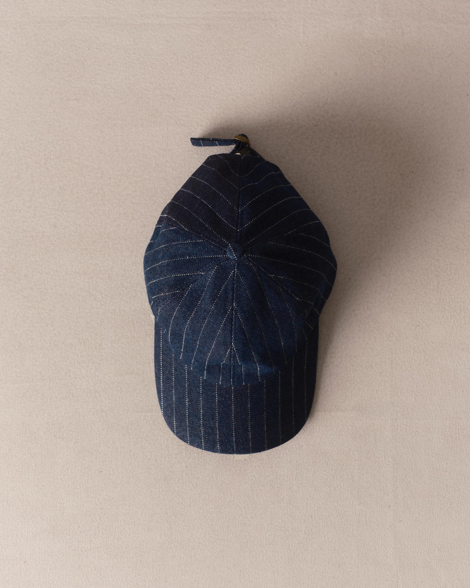 editorial image of The Taylor Stitch x Hypeadelic Cap v2.06 hanging